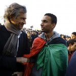 Bernard Henry Lévy in Benghazi with a representative of the Youth Defense Committee of the City. (photo credit: Marc Roussel)