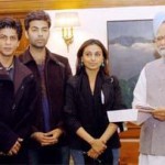 Prime Minister Manmohan Singh accepting donation from the Bollywood stars and directors. (PTI)