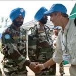 January 2008, George Clooney, appointed UN Messenger for Peace, shakes hands with a member of the Indian Battalion of the United Nations Organization Mission in the Democratic Republic of the Congo, during his tour of the UN Peacekeeping Missions in Africa. (UN Photo/Marie Frechon)