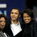Barack Obama, his wife Michelle, right, and Oprah Winfrey wave to the crowd at a 2007 rally in Manchester, N.H. (AP Photo/Elise Amendola)