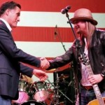 Republican presidential candidate, Mitt Romney shakes hands with musician Kid Rock at a campaign rally. (AP Photo/Gerald Herbert)